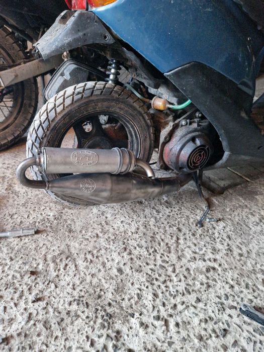 Вихлопна труба на діо 34 лео тт