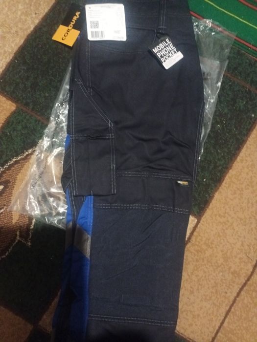 Штани фірмові нові