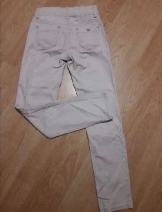 Ubrania 4 szt. Zestaw dziewcz. 134/140 Reserved spodnie sweter t-shirt