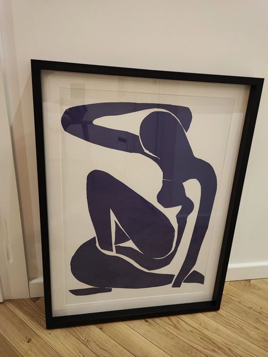 Nowoczesny plakat w czarnej ramie 63×83 cm – minimalistyczna postać