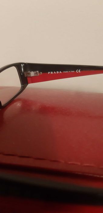 òculos de sol Emporio Armani  e prada
