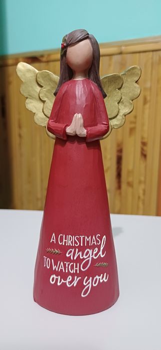 Декоративная рождественская фигурка ангела. 
Это предмет домашнего дек