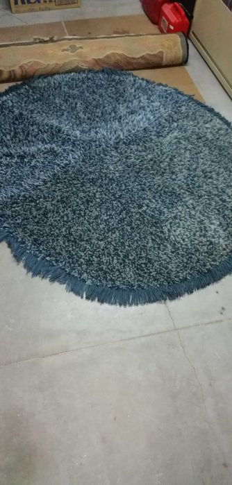 Carpete redonda..