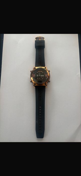 Relogio police dourado e preto
