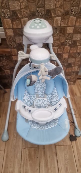 Huśtawka elektryczna bujak Caretero Raffi blue do 12 kg stan bdb