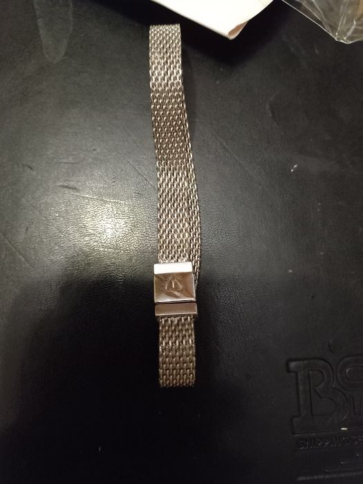 Фирменный браслет Dove  новый