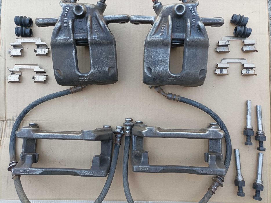 Супорт передній Nissan Note Micra