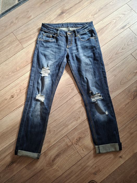 Spodnie jeansy przecierane