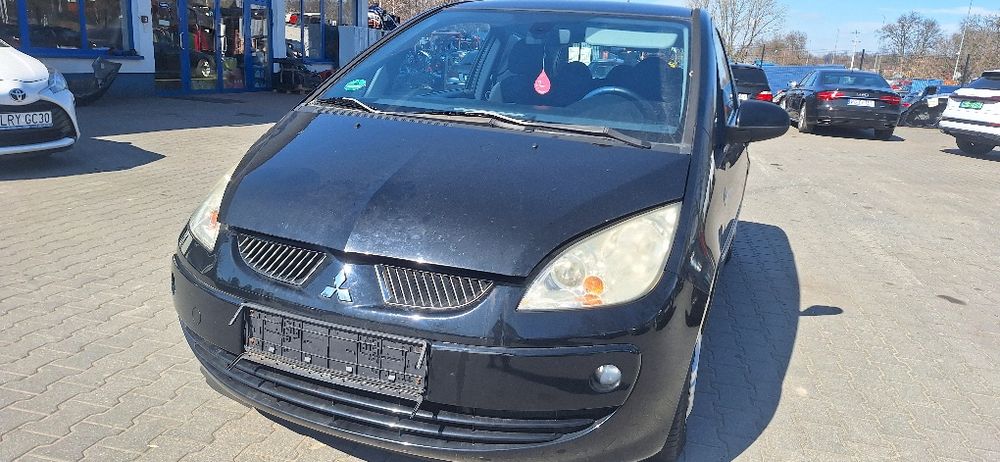 Całe mitsubishi Colt czarny kolor  na części