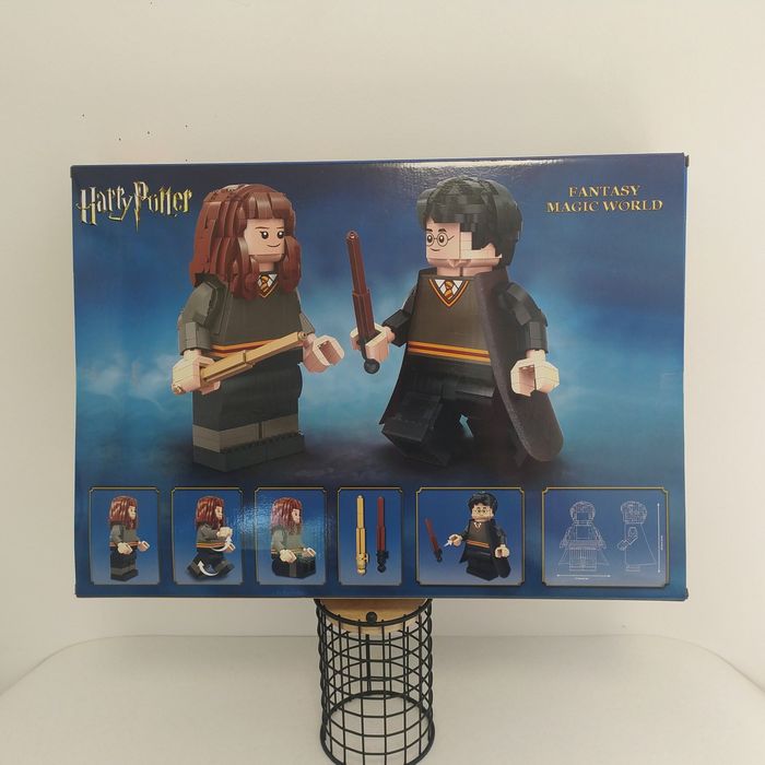 Конструктор Harry Potter 1673 деталей Гаррі та Герміона в Масштабі!