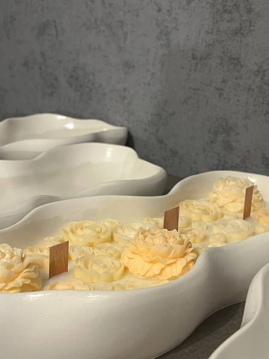 Свеча в гипсовом кашпо