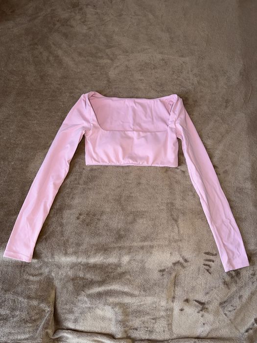 жіночий рожевий спортивний топ