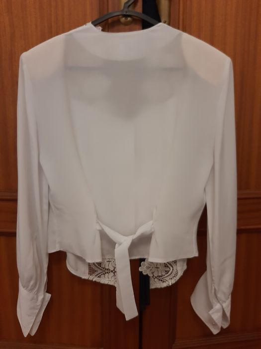 Blusa branca muito bonita