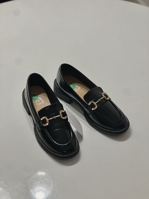 Нові туфлі лофери