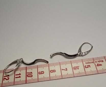 Srebrne wiszące kolczyki wywijane rurki wewnątrz oksydowane