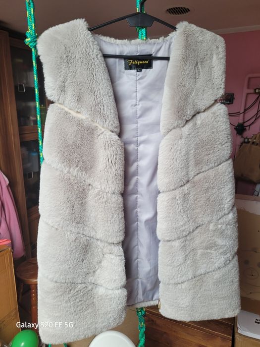 Kamizelka futerko na zamek kieszenie długa modna