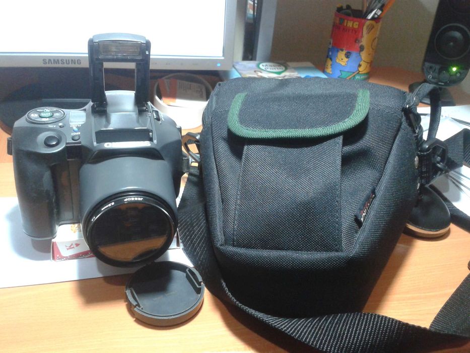 Máquina fotográfica Olympus (rolo)