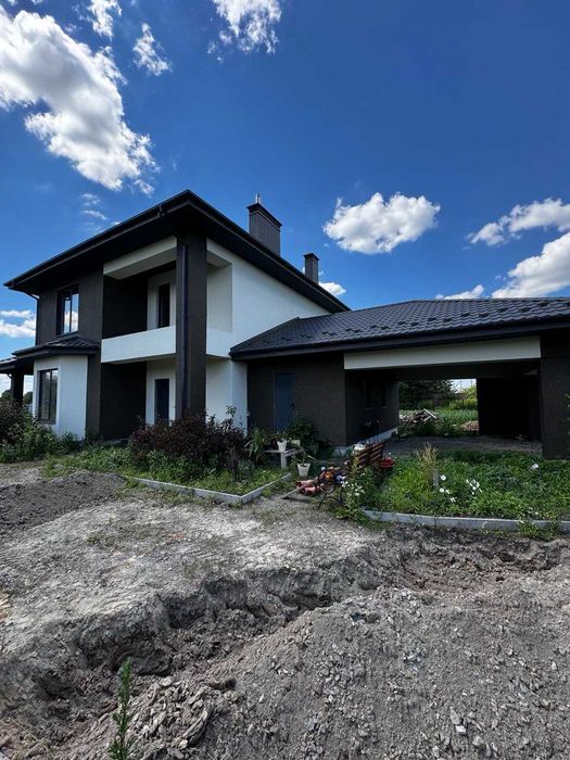 Утеплення фасадів приватних будинків по Київській області. ФАСАДЧИКИ