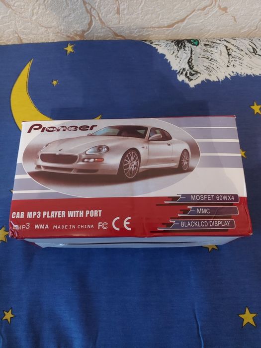 Бюджетна автомагнитола з USB,MP3,блютуз та пульт
