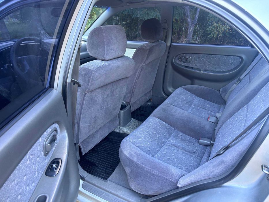 Kia Sephia 2003, Газ/Бензин