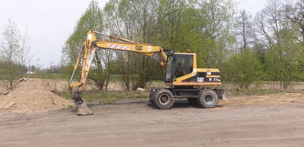 Koparka transport wyburzenia rozbiórki budowa dróg parkingów wjazdów