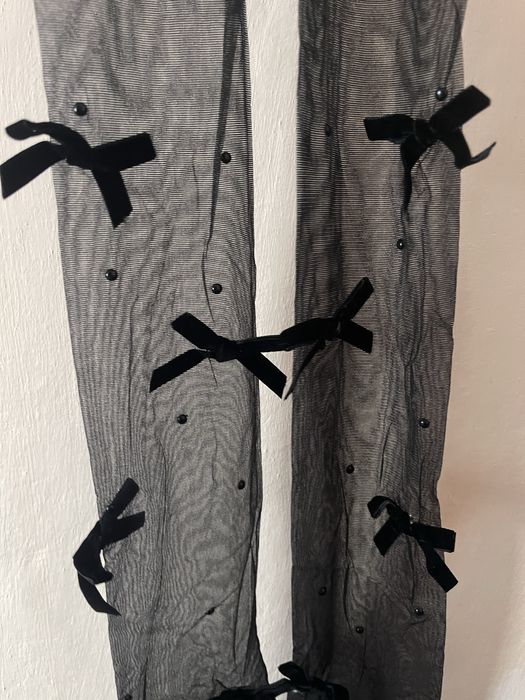 Трендові колготки з бантиками