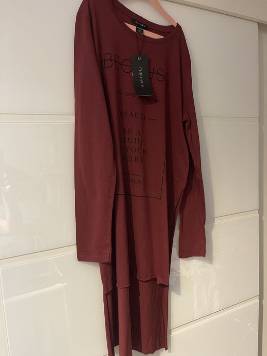 Super bluzka dluzszy tyl super kolor nowa z metka