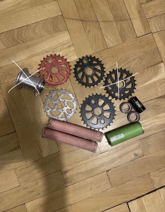Części bmx (opony,zębatki,suport,gripy,peg)
