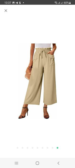 Укороченые брюки немного стрейчевые .