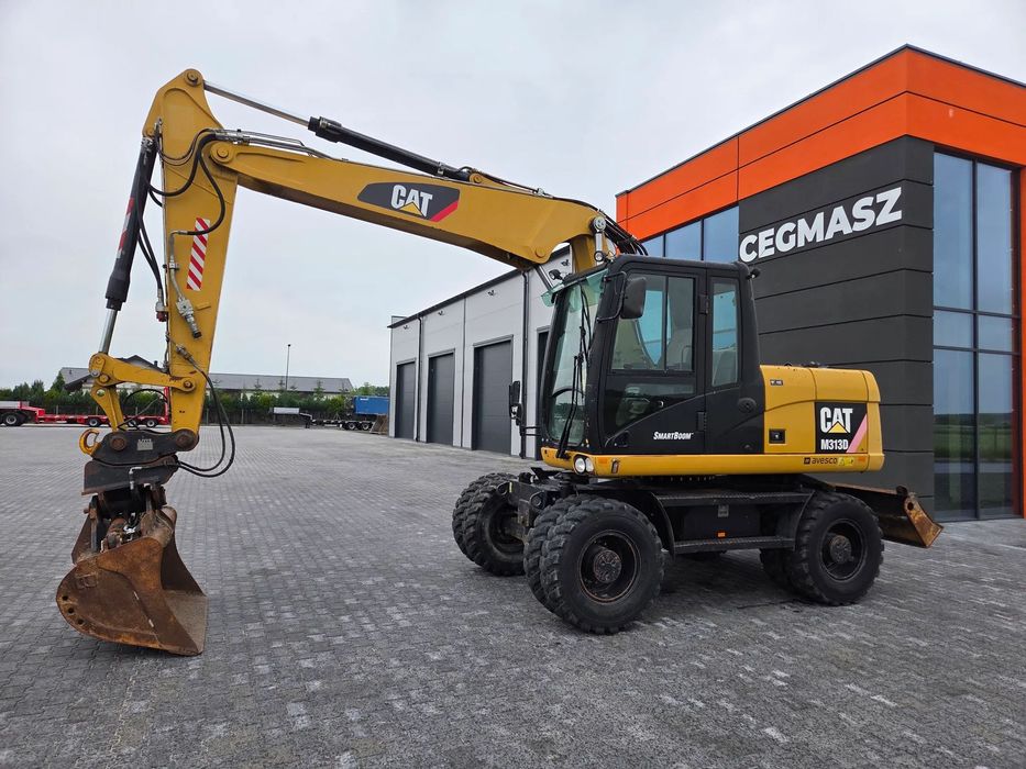 Caterpillar M313D / spr. ze Szwajcarii /