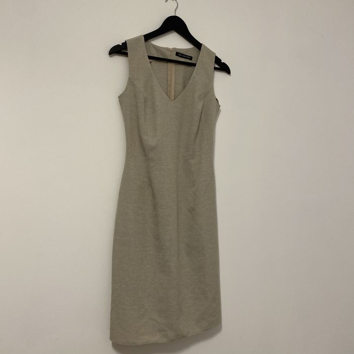 Bezowa dopasowana sukienka 36 S