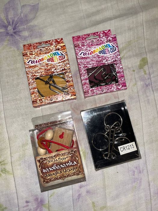 Іграшки головоломки брелки кошельки обручі безкоштовно