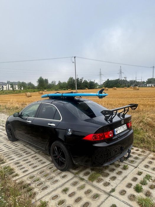 Surf board leash holder for the car