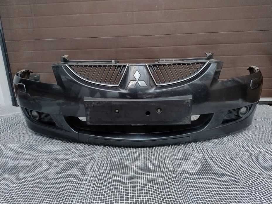 Mitsubishi Lancer 7 VII Sport spryski zderzak przód halogeny wysyłka