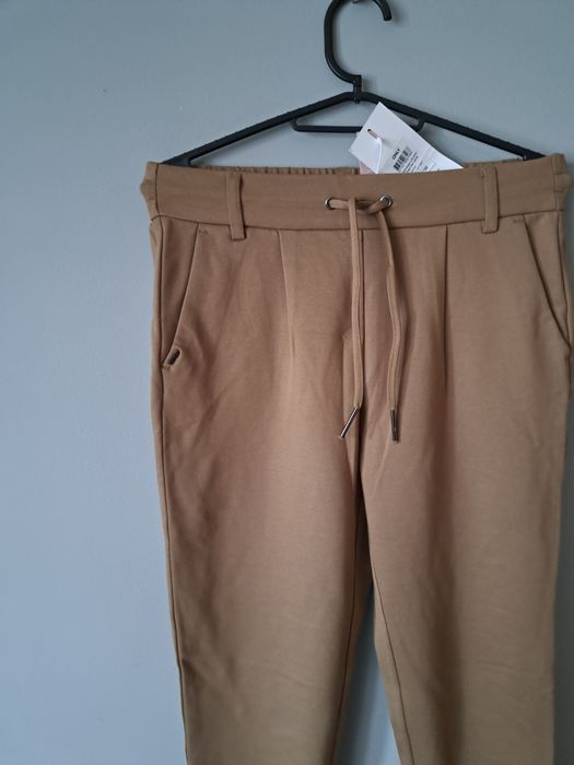 Nowe piękne karmelowe spodnie Xs/34 only