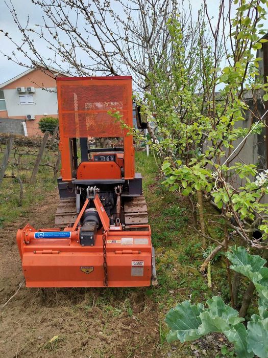 Máquina agrícola de rastos