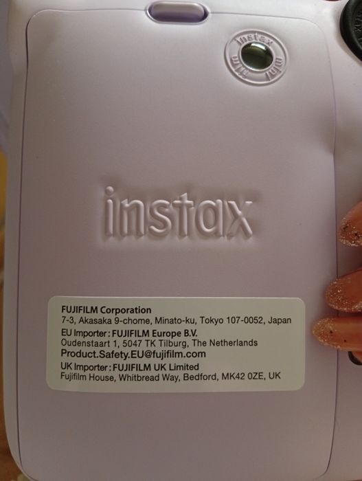 Máquina fotografica instax