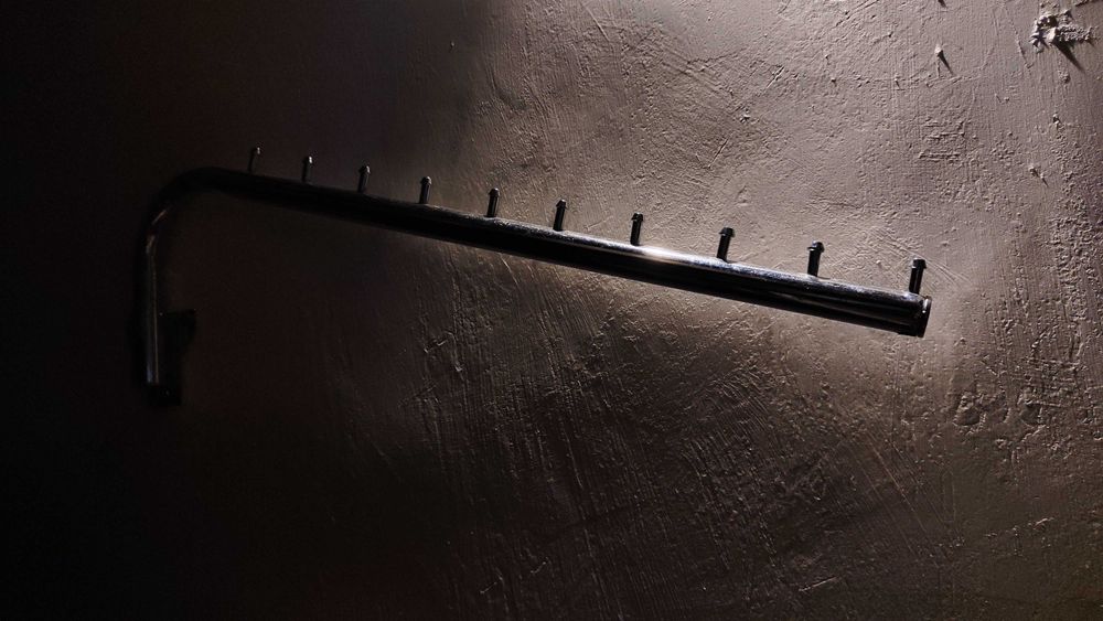 Кронштейн для одяну