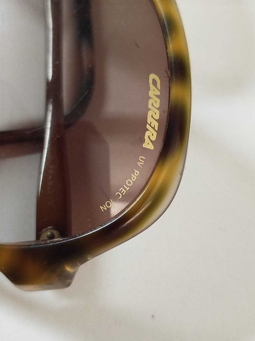 Oculos de sol carrera usados como novos