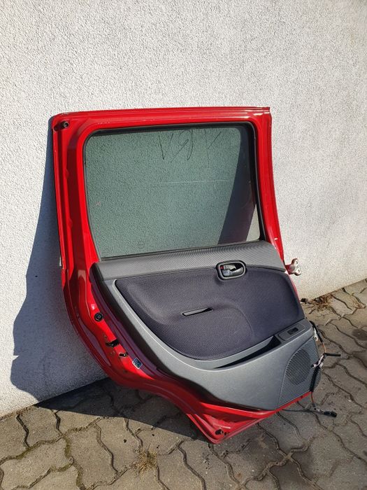 Daihatsu YRV M2 drzwi lewy tył tylne lewe kompletne
