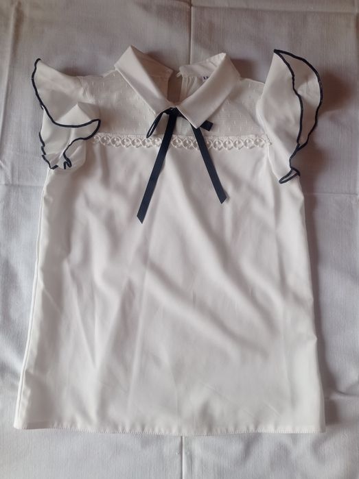 Школьная одежда для девочки.