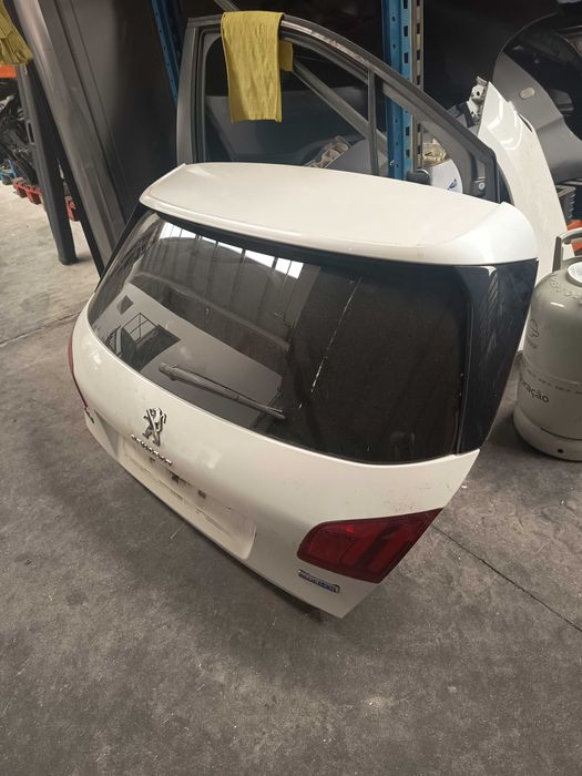 Tampa mala Peugeot 308 ano 2015