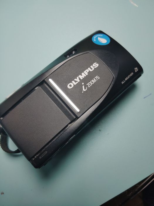 Olympus analogowy bryzgo szczelny datownikpiękny stan poszukiwany model