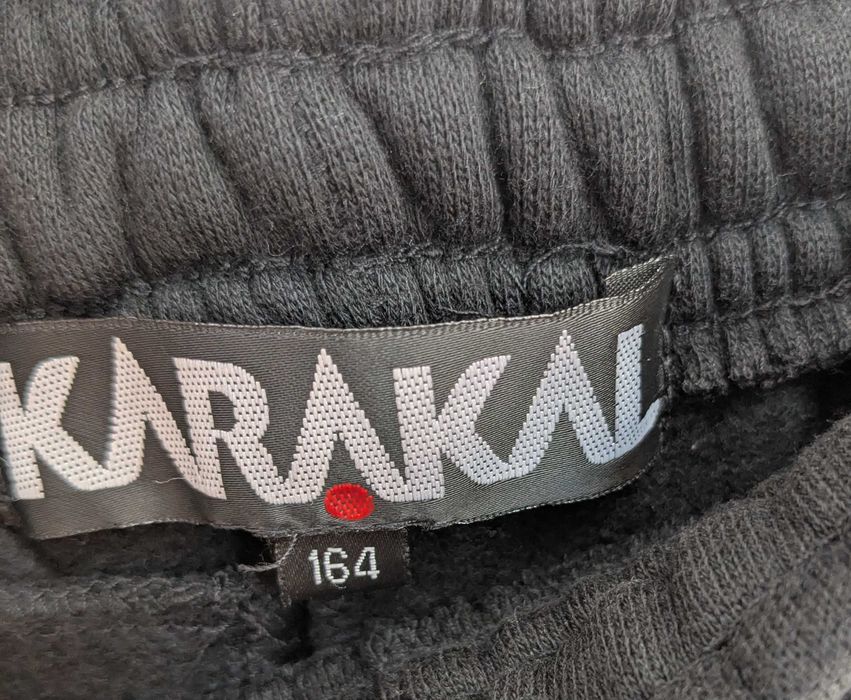 Karakal spodnie dresowe czarne rozm. 164