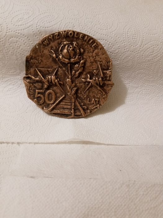 Stary medal z roza 50 lat wyzwolenia