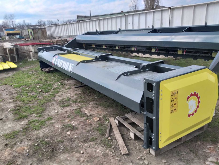 Жатка соняшникова UNICORN від ВИРОБНИКА під комбайн New Holland, Нью-Холланд/ Caterpillar, Катерпіллер / Challenger, Челленджер від 6 до 12 метрів