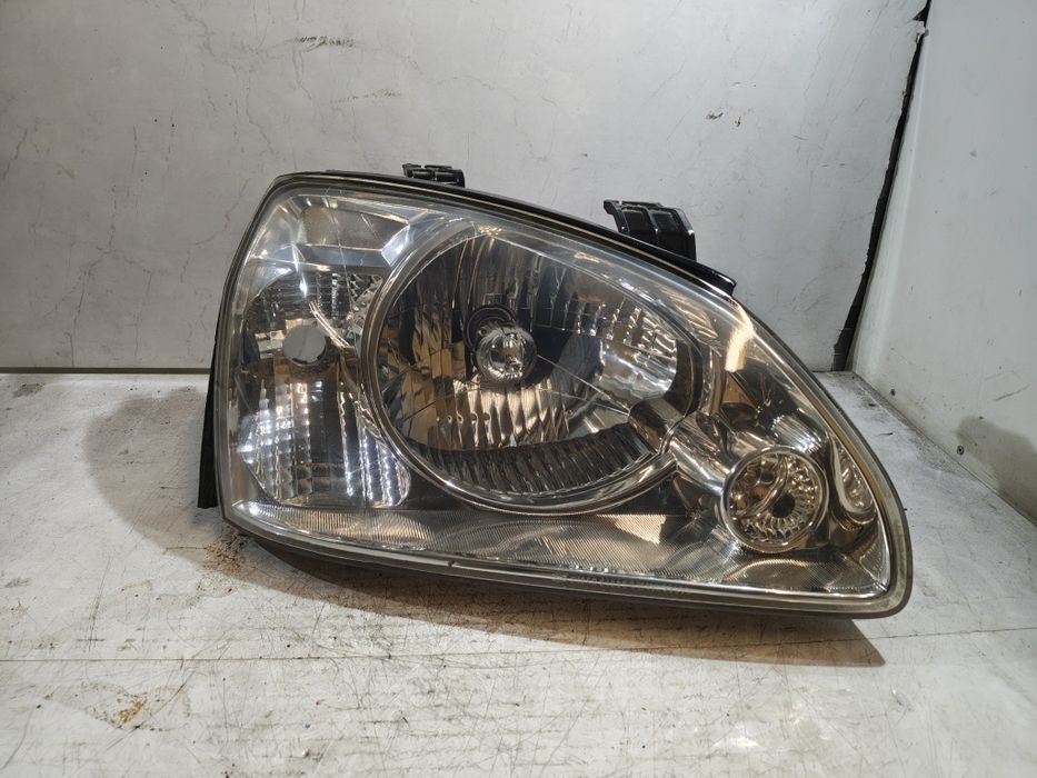 Lampa prawa prawy przód Kia carens II Europa oryginał