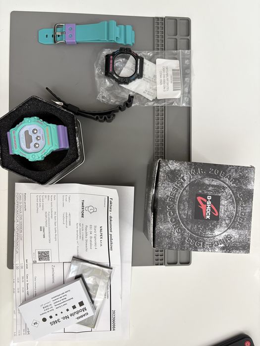 Casio G-Shock DW5900DN Psychodelic full set, dodatkowo oryginalny bezel oraz dwa paski z Ali
