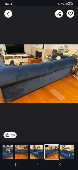 Sofa azul com pouco uso.