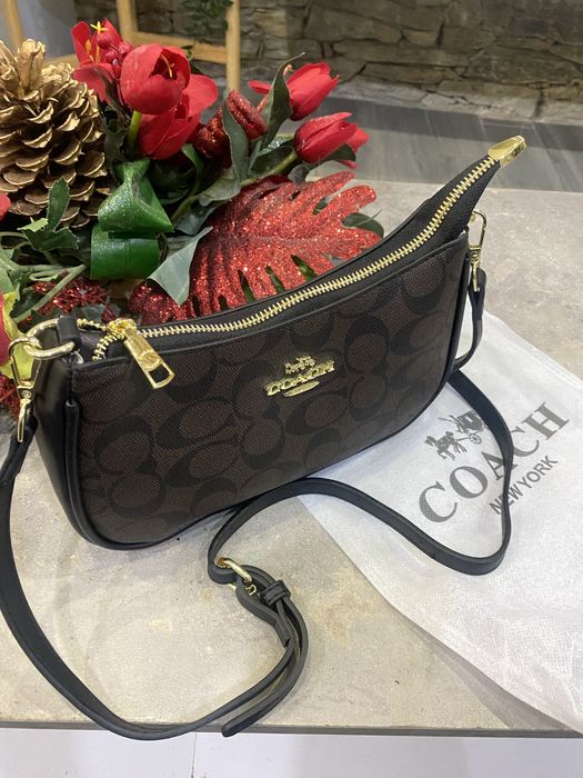 Mala senhora  coach nova muito elegante e muito bom acabamento